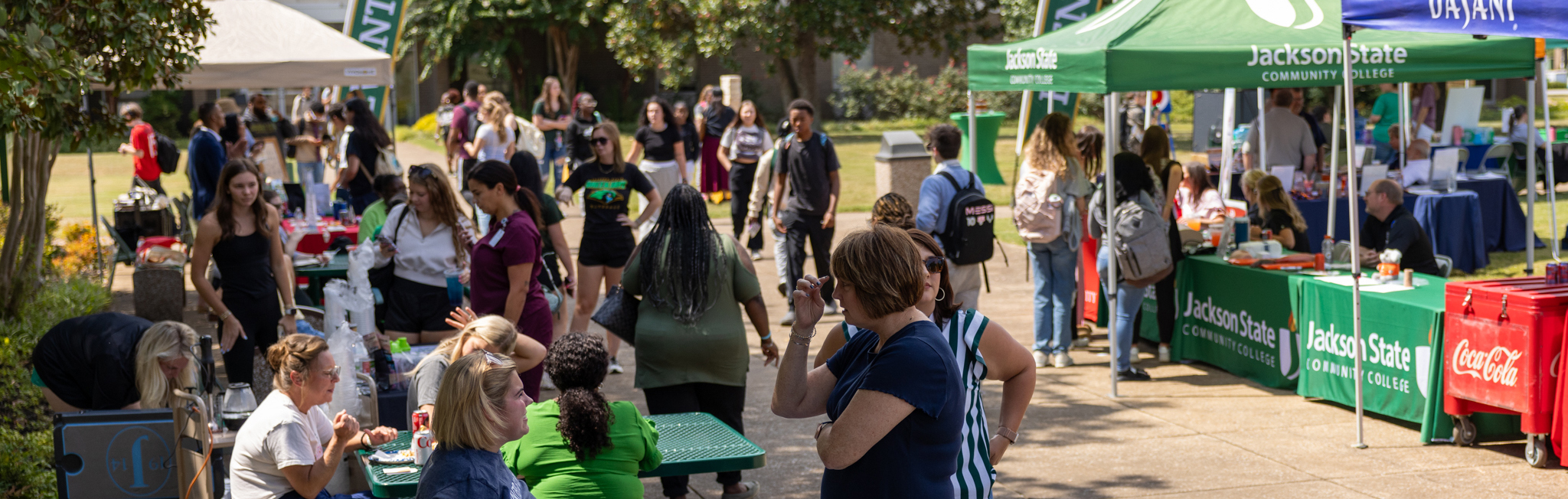 Crowd of people in the JSCC Green Jay Quad during Welcome Back Bash in September 2025.