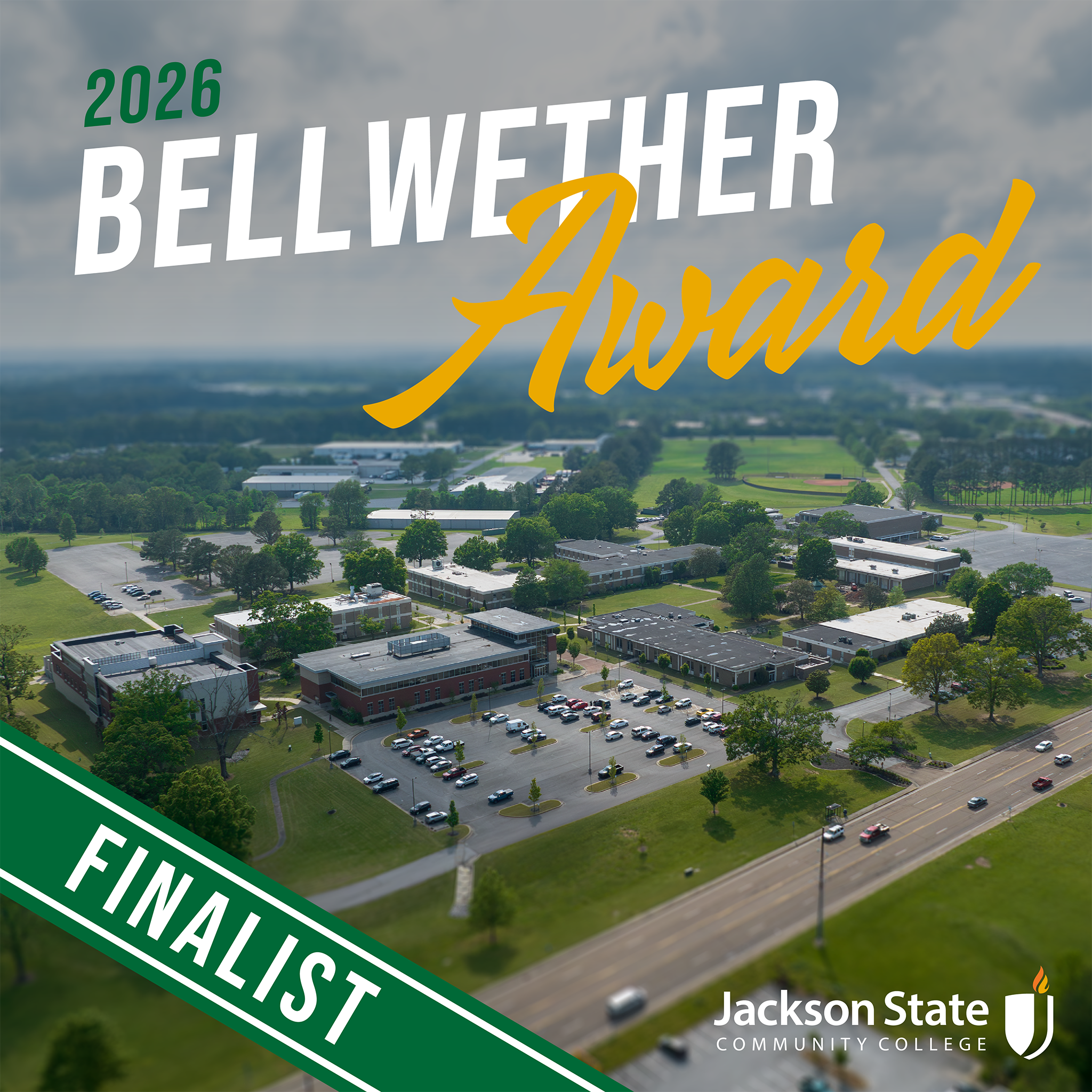 Aerial view of Jackson State Community College campus with multiple buildings, parking lots, and surrounding green spaces under a cloudy sky. Overlaid text reads ‘2026 Bellwether Award’ in large white and gold letters. A green diagonal banner at the bottom left corner says ‘Finalist.’ Jackson State Community College logo appears in the bottom right corner.